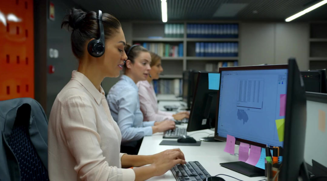 Customer service professionals wearing headsets